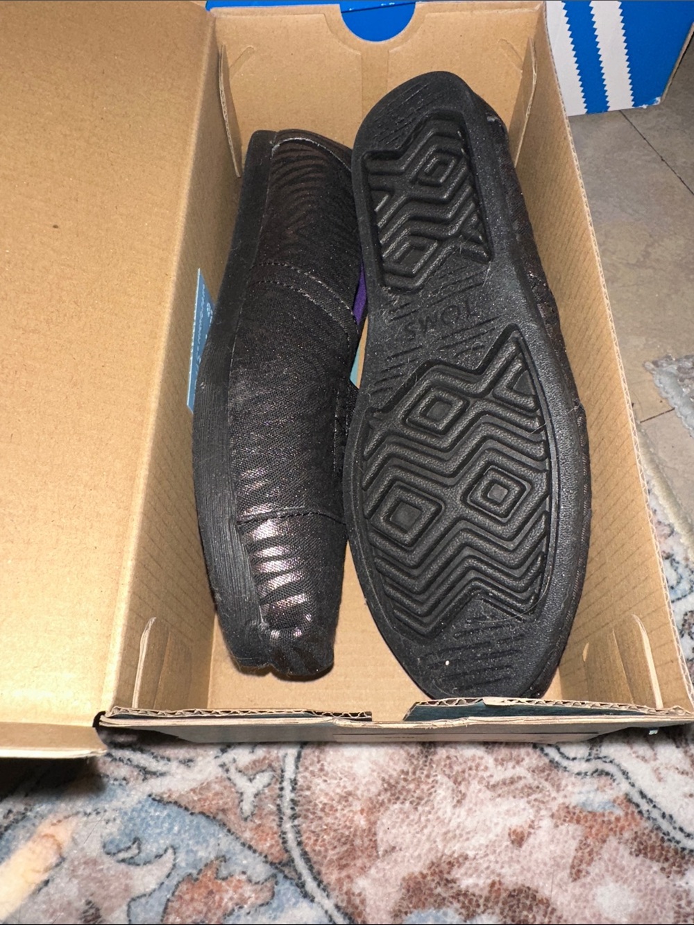 Woman’s Black Slip-On Comfort Shoes Toms